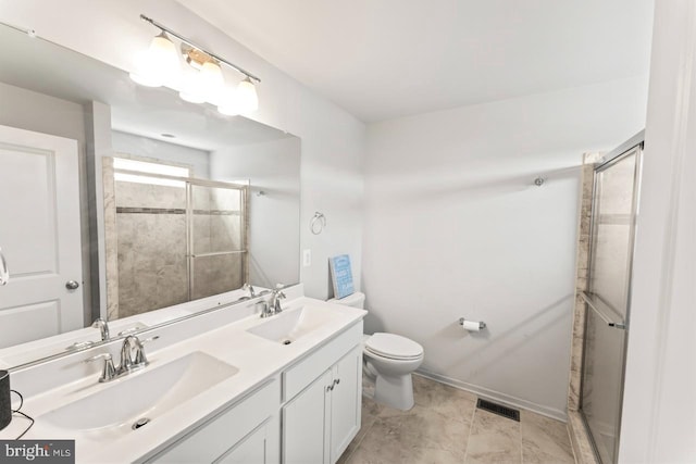 bathroom featuring visible vents, a sink, a shower stall, and toilet