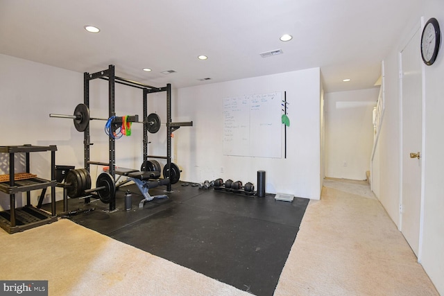 exercise area featuring recessed lighting and visible vents