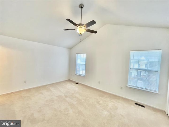 11732 Stonegate Ln, Columbia, MD 21044 - empty room with a ceiling fan, light carpet, and high vaulted ceiling