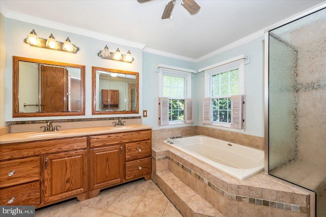 bathroom with double vanity, ornamental molding, a bath, and a sink