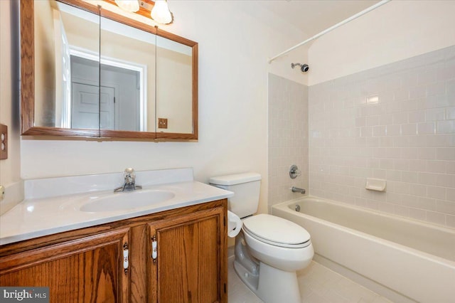 bathroom with bathing tub / shower combination, toilet, and vanity