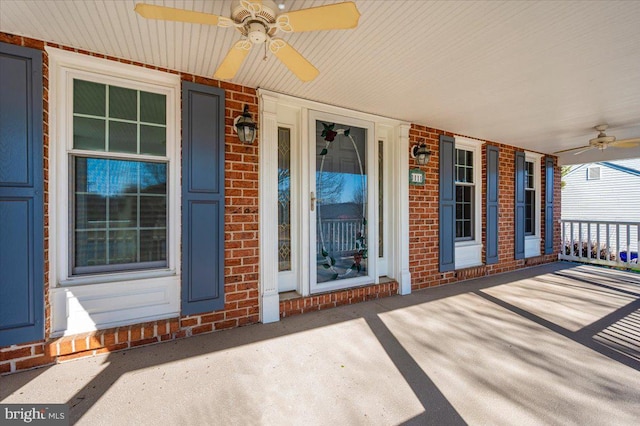 view of patio featuring covered porch and a ceiling fan