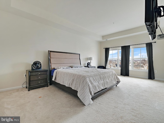 carpeted bedroom with baseboards