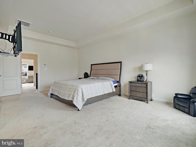 bedroom with carpet, visible vents, and baseboards