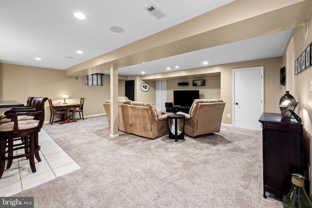 living area with light tile patterned floors, light colored carpet, visible vents, baseboards, and recessed lighting