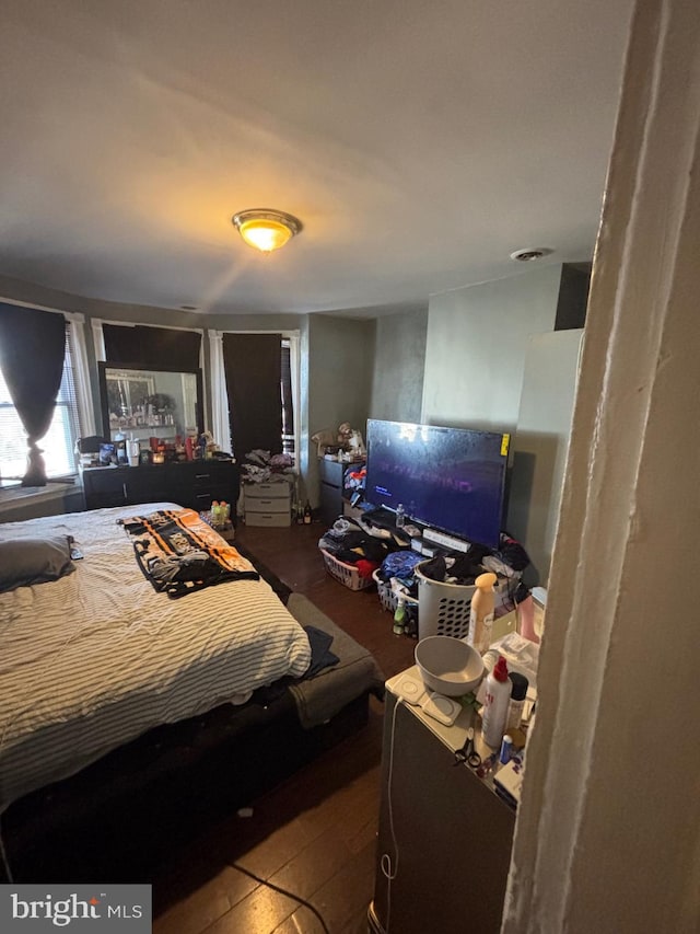 bedroom featuring visible vents