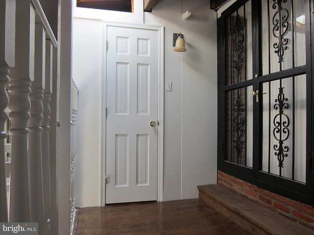 foyer entrance featuring wood finished floors