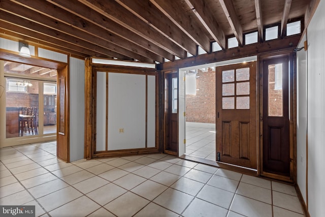 entrance foyer with light tile patterned floors