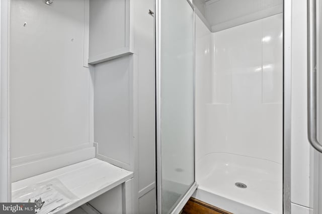 full bathroom with a stall shower