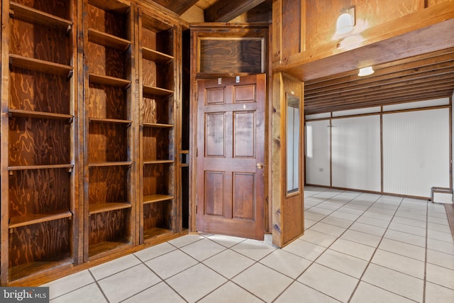 spare room featuring light tile patterned floors