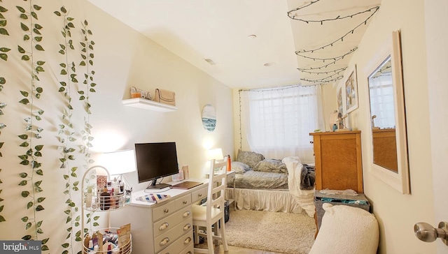 bedroom featuring visible vents