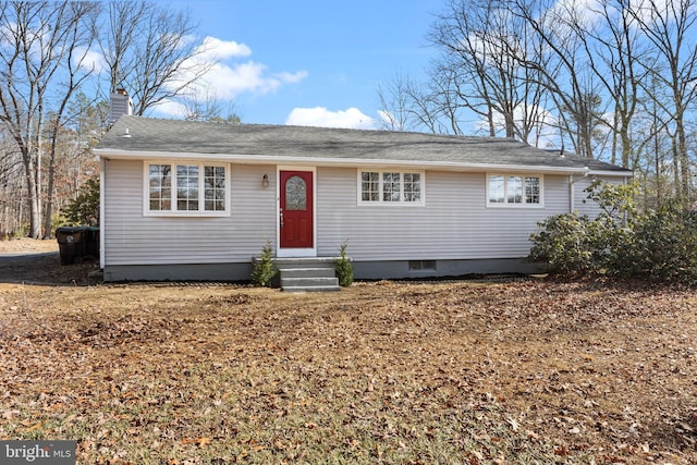 ranch-style home with entry steps and a chimney