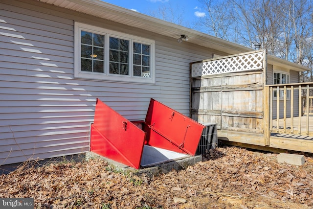 exterior space with a bulkhead entry and cooling unit