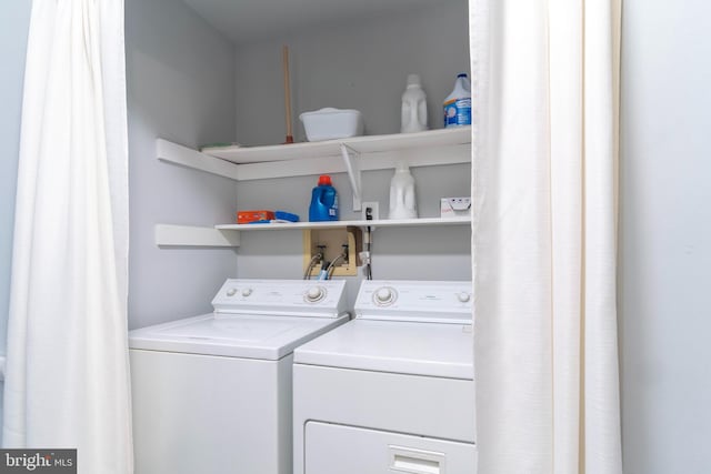 laundry area featuring laundry area and independent washer and dryer