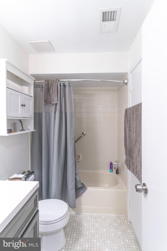 full bathroom with shower / tub combo, visible vents, toilet, tile patterned flooring, and vanity