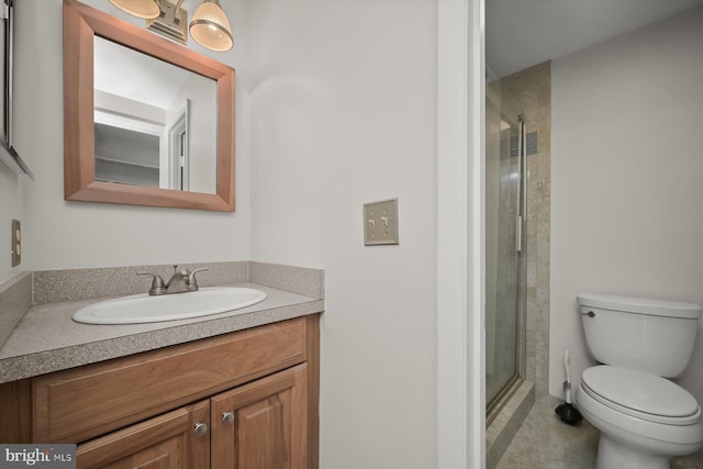 full bath with toilet, a shower stall, and vanity