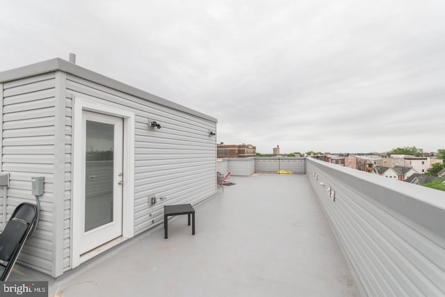 view of patio featuring a balcony