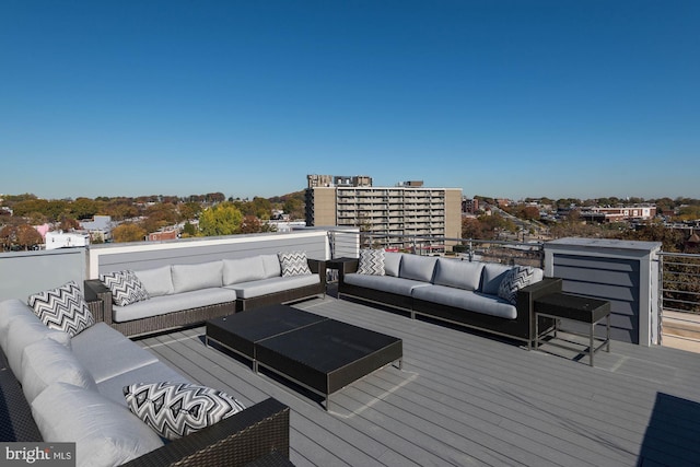 wooden deck featuring outdoor lounge area