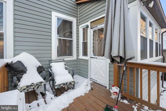 view of snow covered deck