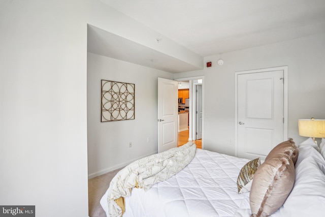 bedroom featuring baseboards