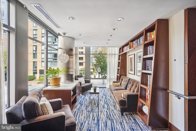 living area with a wealth of natural light and recessed lighting