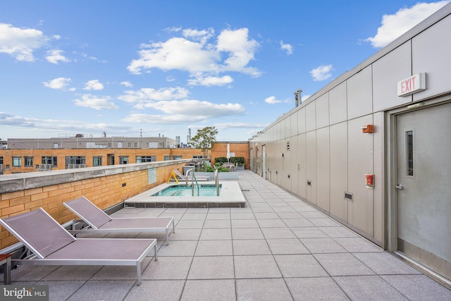 view of swimming pool with a patio area