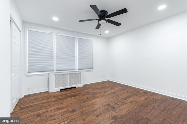 unfurnished bedroom featuring baseboards, dark wood-type flooring, visible vents, and recessed lighting