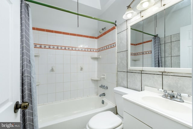 bathroom featuring tile walls, tasteful backsplash, shower / bathtub combination with curtain, toilet, and vanity