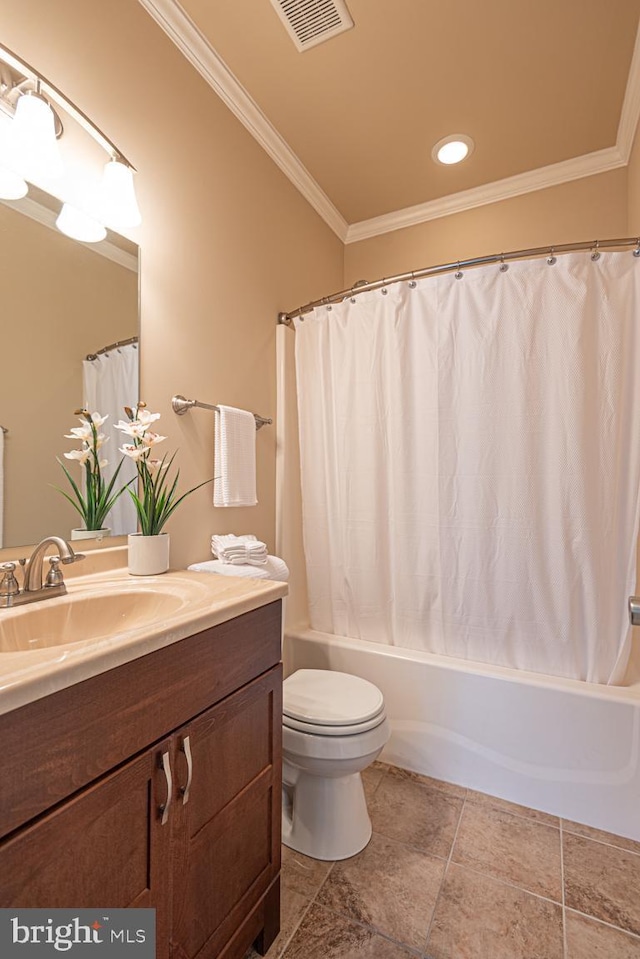 bathroom with vanity, crown molding, toilet, and visible vents