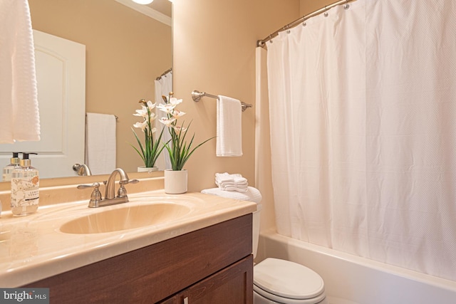 full bathroom with toilet, vanity, and shower / bath combo with shower curtain