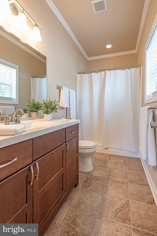 full bath with visible vents, toilet, a shower with shower curtain, ornamental molding, and vanity