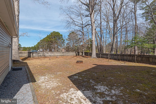 view of yard featuring a fenced backyard