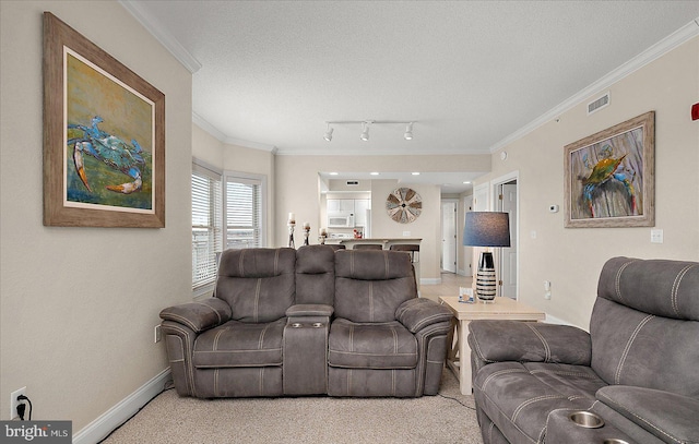 living area with crown molding, light colored carpet, visible vents, a textured ceiling, and baseboards