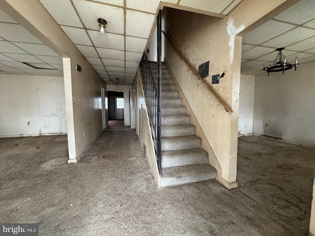 staircase with a drop ceiling