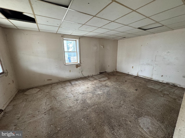 empty room with a drop ceiling