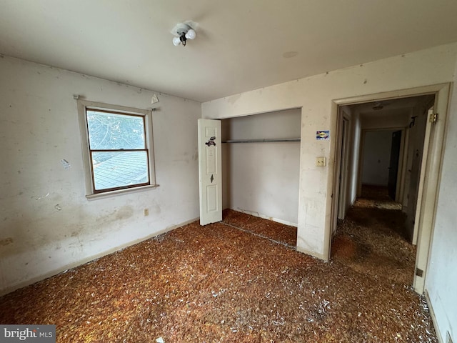 unfurnished bedroom featuring a closet