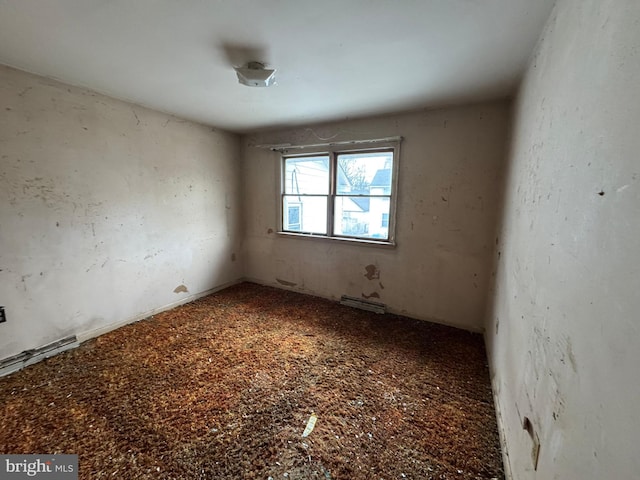 unfurnished room with visible vents