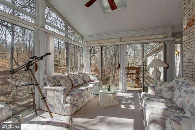 sunroom with vaulted ceiling and ceiling fan