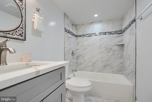 full bath with marble finish floor, recessed lighting, shower / bathing tub combination, toilet, and vanity