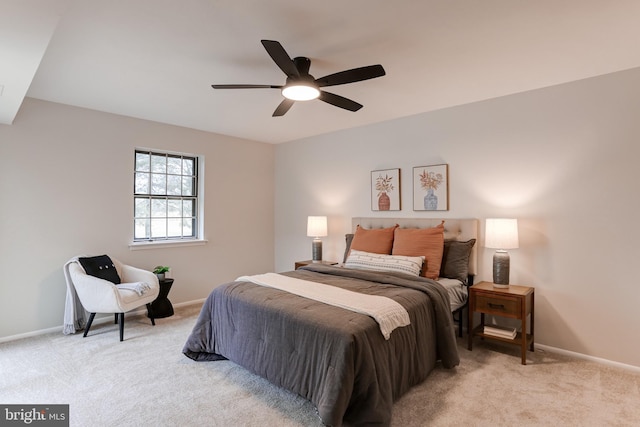 bedroom featuring carpet, baseboards, and ceiling fan