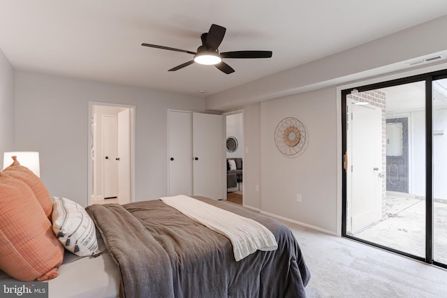 bedroom featuring light colored carpet, visible vents, a ceiling fan, access to outside, and baseboards