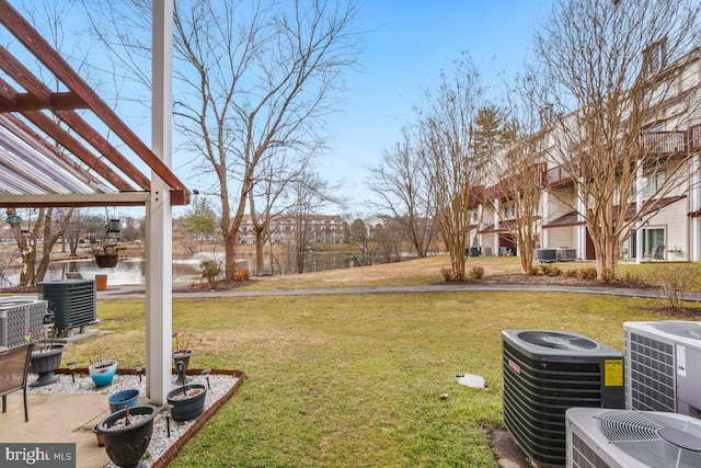 view of yard featuring central AC unit