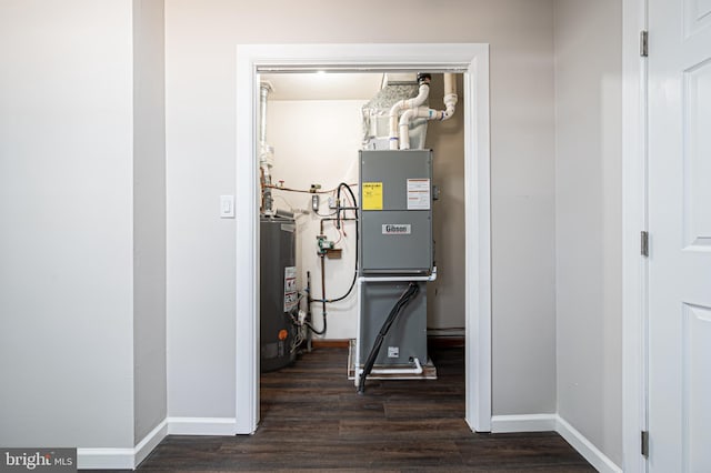 utility room with water heater