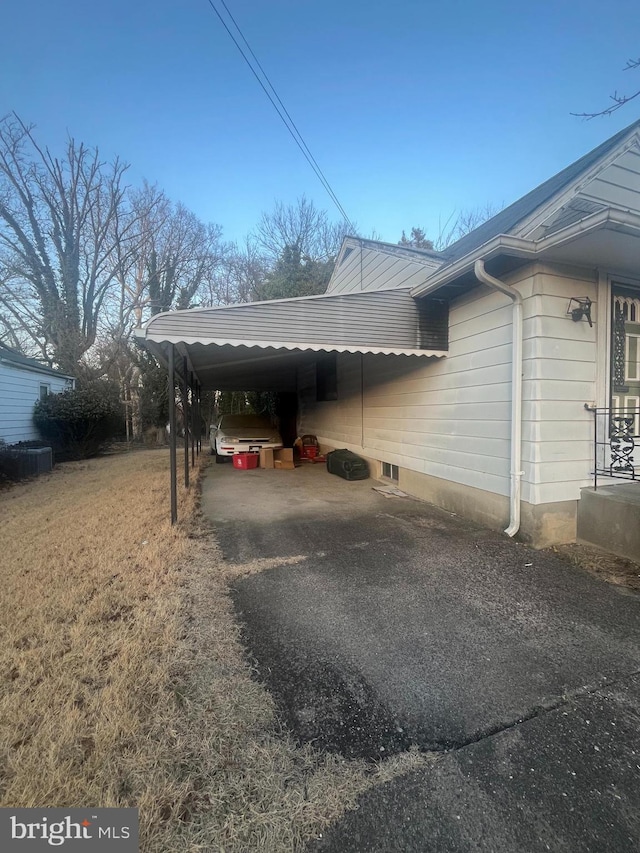 view of car parking with a carport