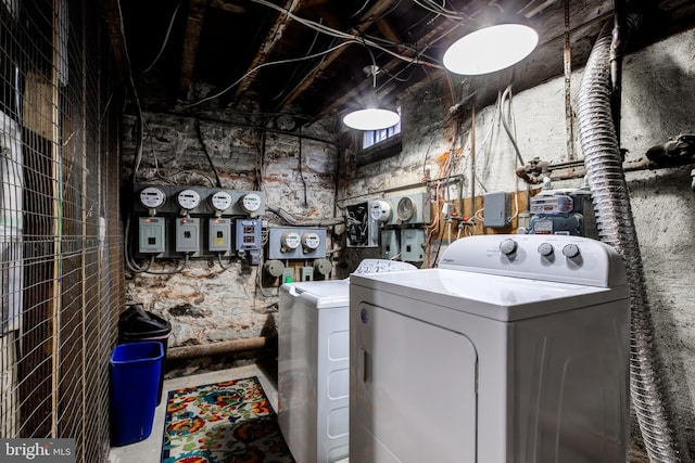 washroom with laundry area and washer and dryer