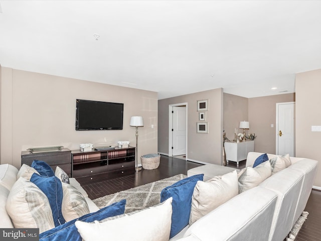 living area featuring dark wood-style floors