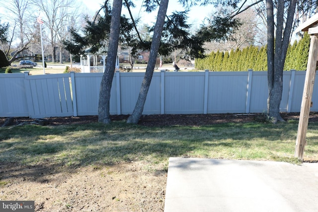 view of yard featuring fence