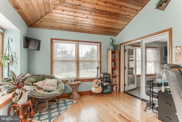 living area with wood ceiling, french doors, wood finished floors, and vaulted ceiling