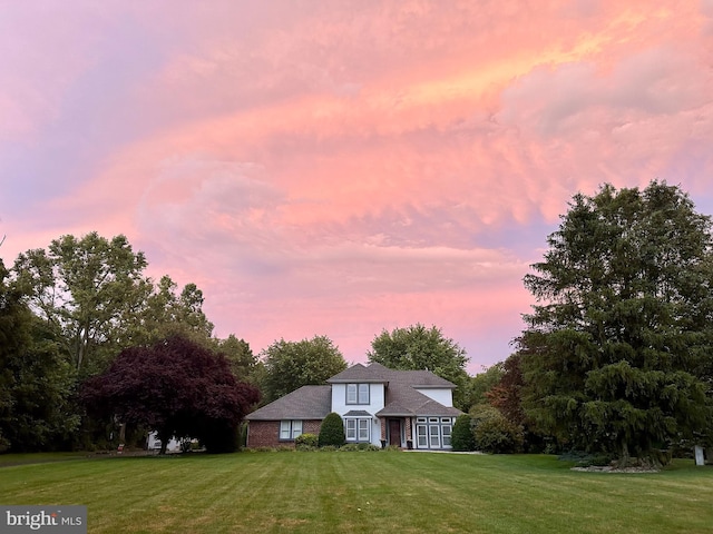 view of front of house with a front lawn