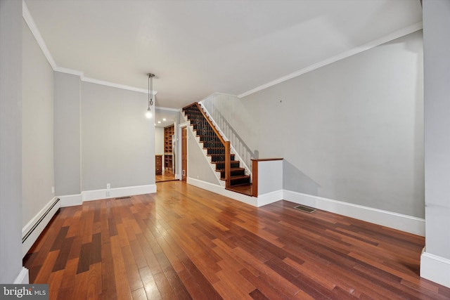 unfurnished living room with hardwood / wood-style flooring, visible vents, stairs, ornamental molding, and baseboard heating